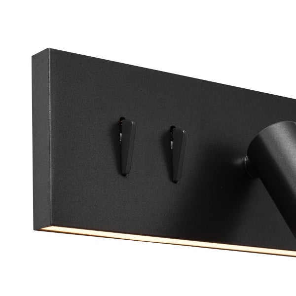 Schwarze Wandleuchte mit LED-Beleuchtung.