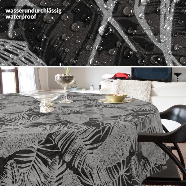 Runde wasserundurchlässige Tischdecke mit Palmenblatt-Muster, Detailansicht von Wassertropfen und Ansicht in einem Wohnzimmer.