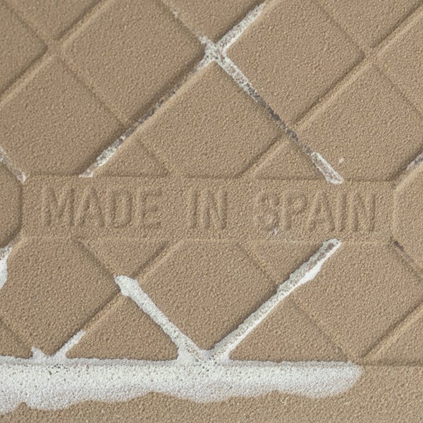 Rückseite einer Fliese mit Prägung Made in Spain