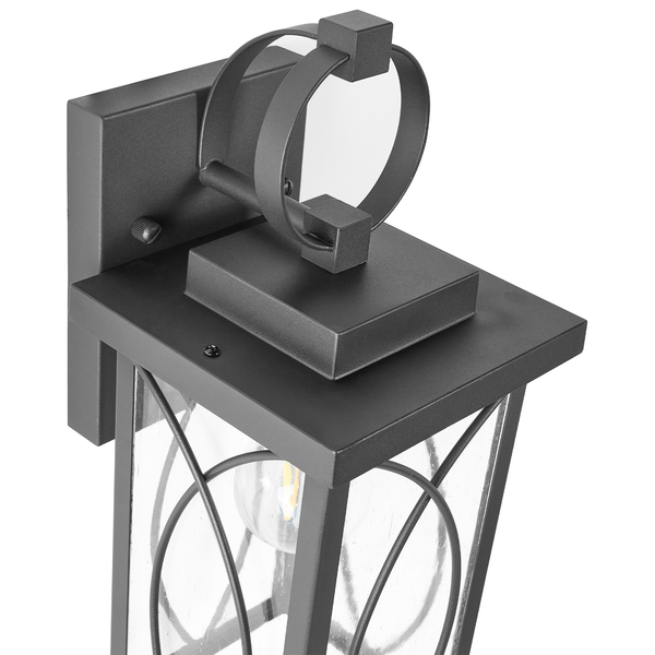 Schwarze Außenwandleuchte aus Metall und Glas im Laternen-Design mit runden Zierelementen.