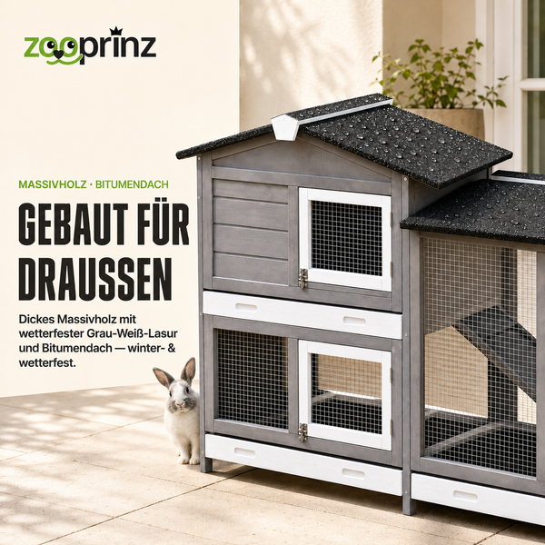 Wetterfester, grau-weißer Kleintierstall aus Massivholz mit zwei Etagen, Bitumendach und integriertem Freilaufgehege.