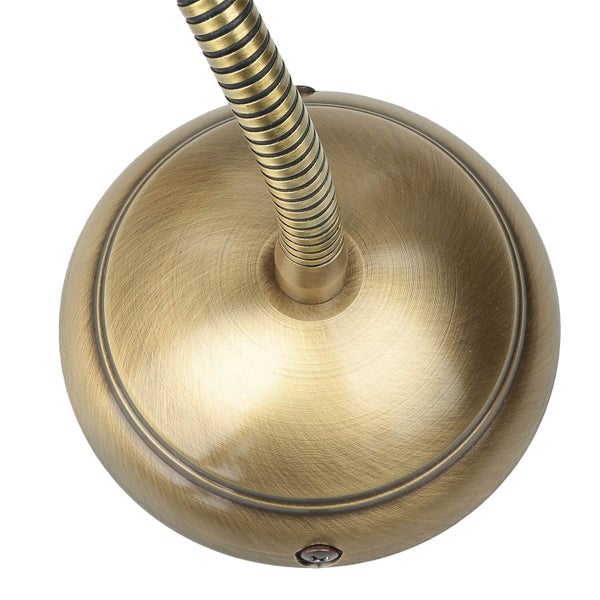 Nahaufnahme einer flexiblen Tischleuchte mit Metallfuß