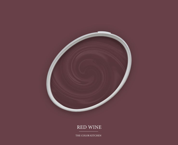 Farbmuster der Wandfarbe Red Wine von The Color Kitchen in einem ovalen Kunststoffdeckel.