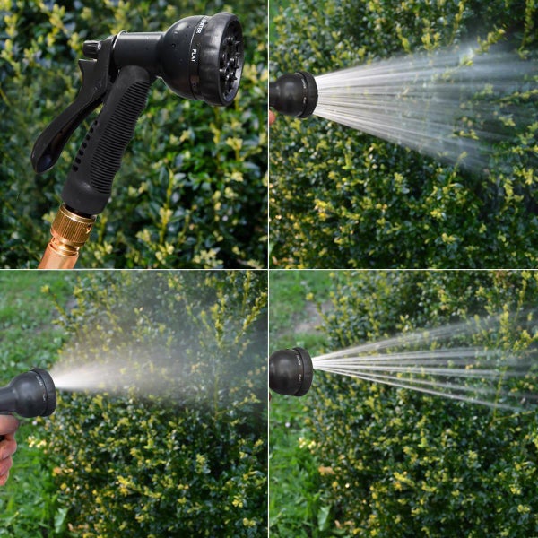 Garten-Spritzpistole aus Kunststoff mit verschiedenen Sprühfunktionen und Messing-Anschluss, im Einsatz bei der Bewässerung einer Hecke.
