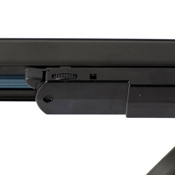 Nahaufnahme einer schwarzen Kunststoffkomponente mit Einstellrad und kleiner Öffnung.