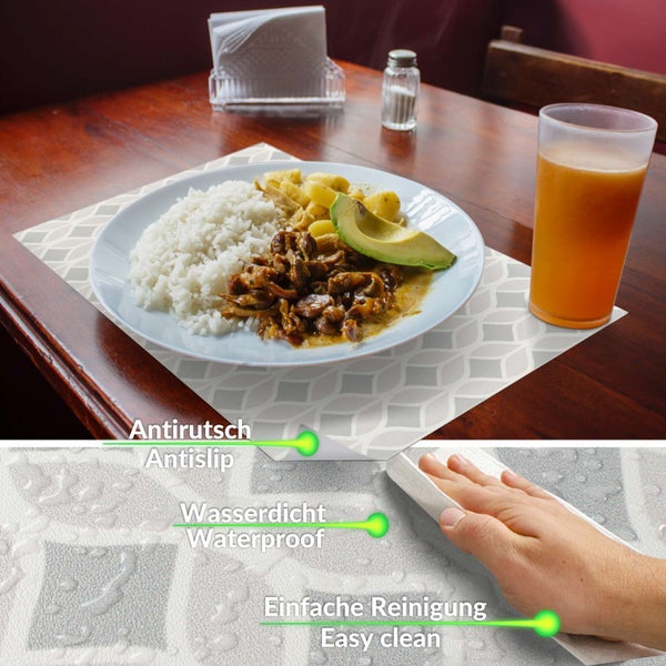 Tischset mit geometrischem Muster auf einem Holztisch, rutschfest, wasserdicht und leicht zu reinigen durch Abwischen.