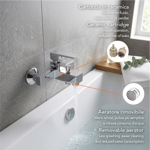Wandmontierte Badewannenarmatur in Chromoptik mit Keramikkartusche und abnehmbarem Luftsprudler über einer Badewanne.