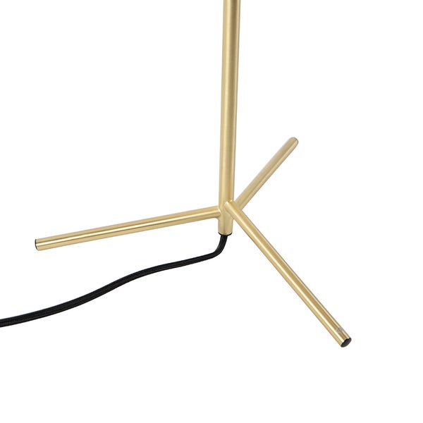 Detailaufnahme des Standfußes einer Stehlampe mit Kabel