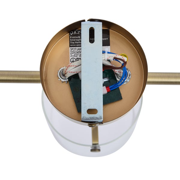 Detailansicht einer bronzefarbenen Wandleuchte mit Lampenfassung und Befestigungsmaterial.