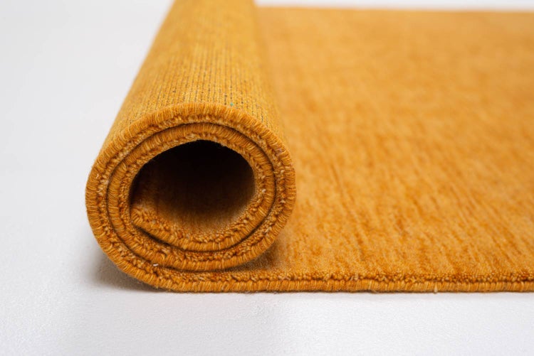 Wollteppich Luxus Designerteppich moderner uni Teppich aus reiner Schurwolle Gold 140x200 cm