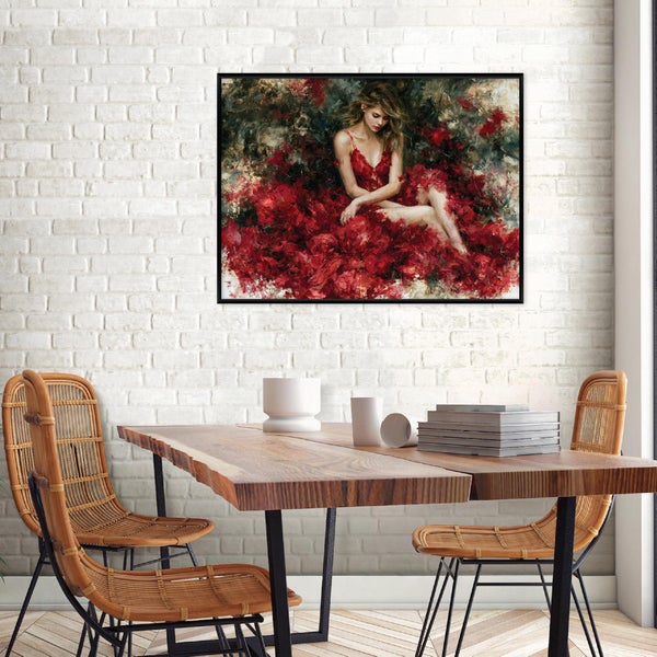 Wandbild mit einem Gemälde einer Frau in einem roten Kleid, gerahmt und über einem Holztisch mit Korbstühlen an einer Backsteinwand hängend.