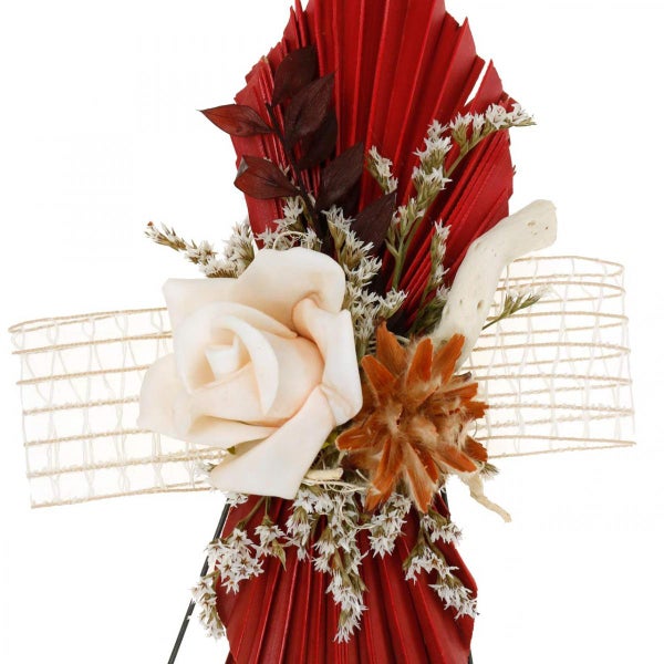 Dekoration mit Rose, Blättern und Zierband