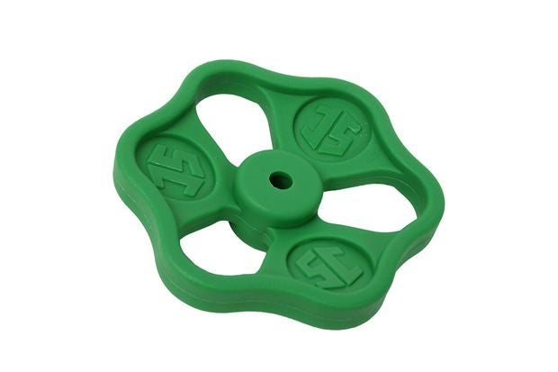 Grünes Handrad aus Kunststoff für Ventile, sternförmig mit Speichen und JS-Markierung.
