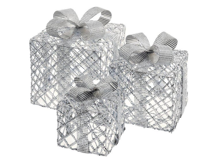 Drei dekorative Weihnachtsgeschenkboxen aus Drahtgeflecht mit glitzernden Schleifen als Weihnachtsdekoration