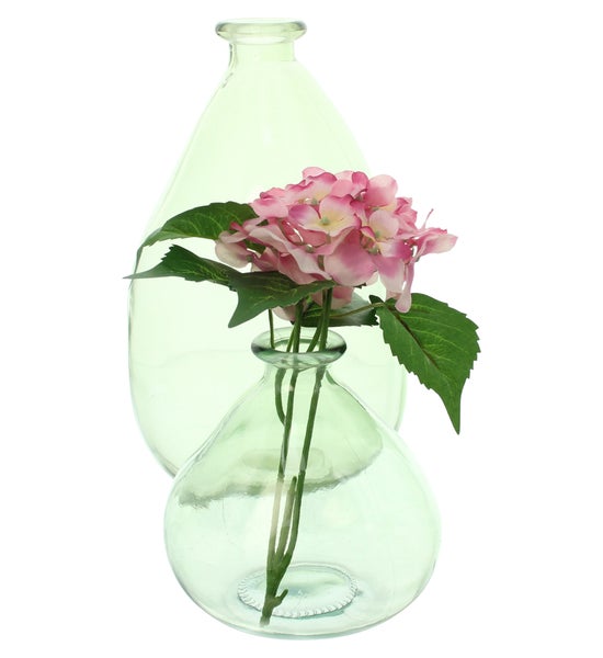Dekorative Glasvasen mit Hortensienblüten
