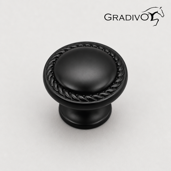 Runder schwarzer Möbelknopf mit dekorativem Kordelrand, Gradivo Logo.