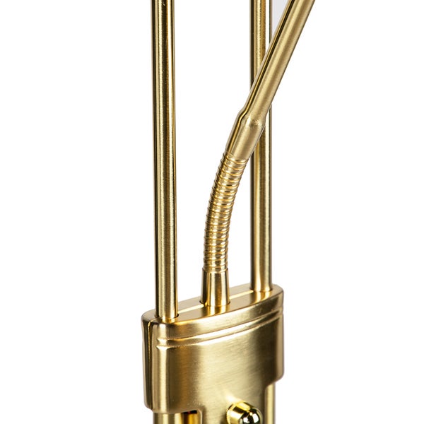 Detailaufnahme einer goldenen Lampe mit flexiblem Arm