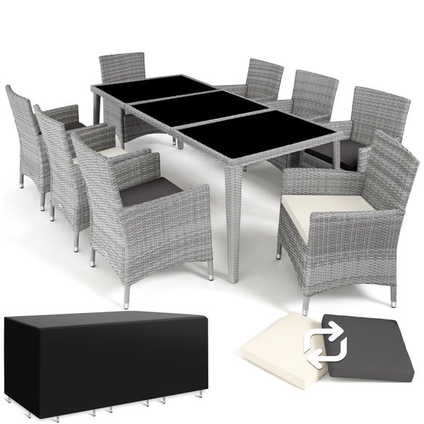 Gartenmöbel-Set mit großem rechteckigem Glastisch, acht Sesseln aus Polyrattan, Wendekissen und einer Schutzhülle.