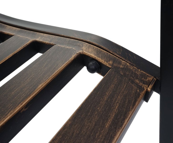 Detailansicht einer Gartenbank aus Metall mit Antik-Bronze-Finish und einer Schutzkappe für Schrauben.