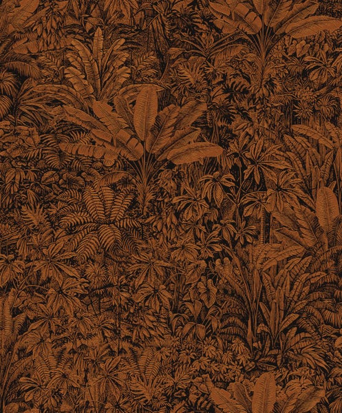 Im Bild ist eine Teppichmispel mit roten Beeren auf Steinen zu sehen.