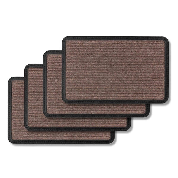 Fußmatten mit Streifenstruktur und dekorativem Rand im Stapel