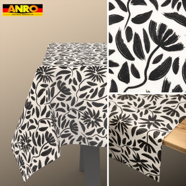 Abwaschbare Tischdecke von ANRO mit floralem Muster aus schwarzen Blumen und Blättern auf weißem Grund. ANRO Logo.