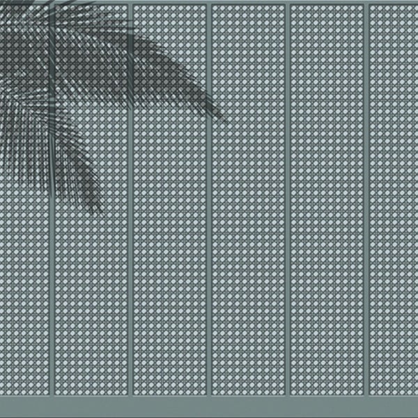 Dekorative Sichtschutzwand mit Rattanmuster und Schatten einer Palme