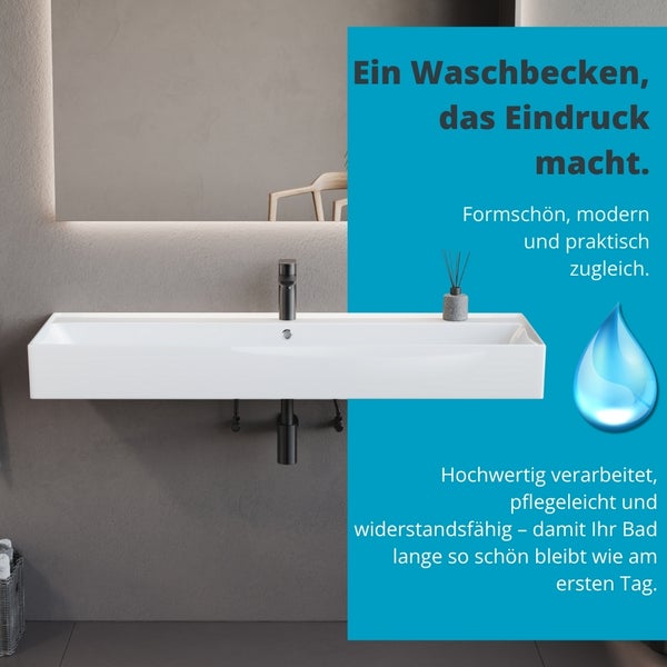 Modernes Bad mit weißem Waschbecken und schwarzer Armatur
