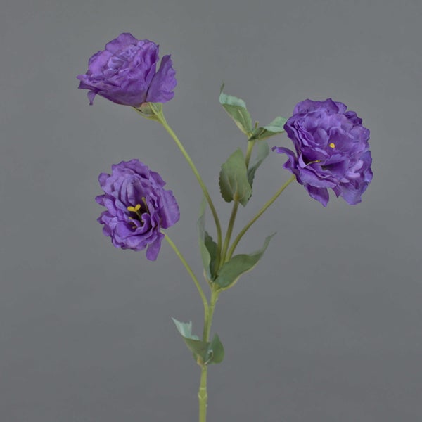 Künstliche Lisianthus mit drei violetten Blüten und grünen Blättern.