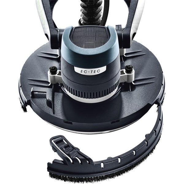 Festool Absaugmobil Cleantec angeschlossen an einen Langhalsschleifer bei der Wandbearbeitung in einem hellen Raum auf einer Baustelle.