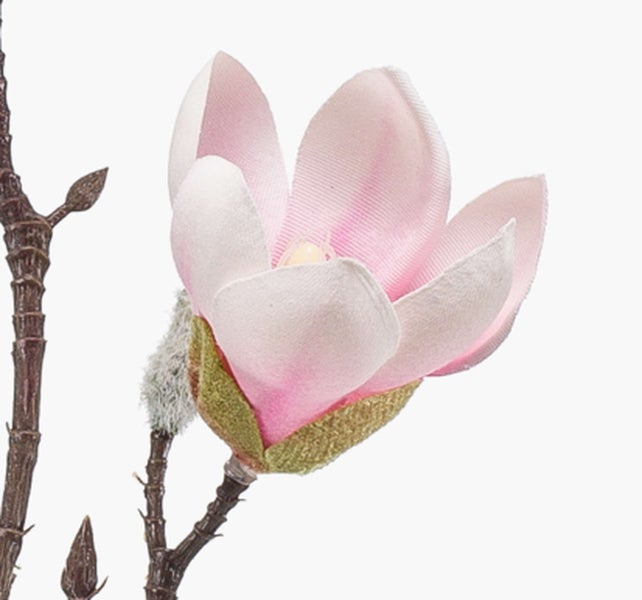 Künstlicher Magnolienzweig mit rosa Knospe und braunem Stiel.