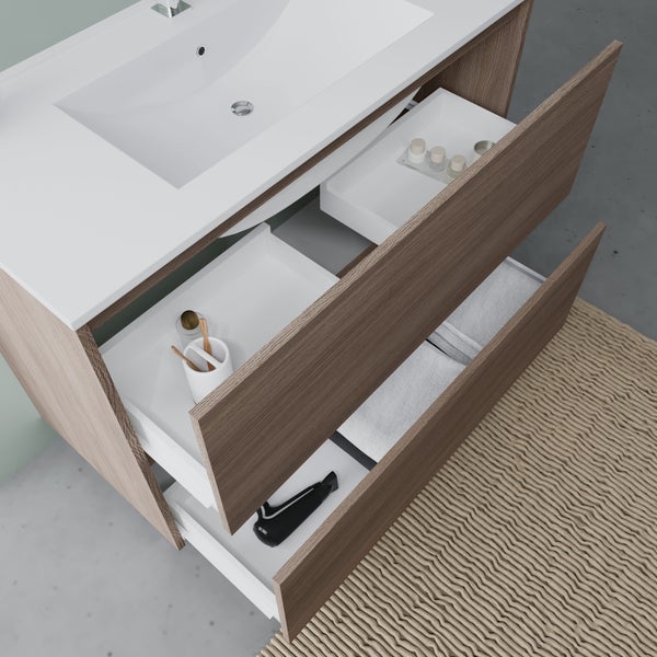 Waschtischunterschrank mit offenen Schubladen und Badutensilien