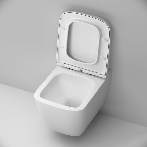 Wand-WC aus Keramik mit geöffnetem Deckel in Weiß.
