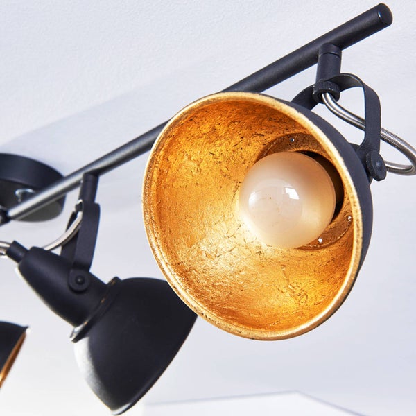 Schwarze Deckenleuchte mit goldenem Reflektor und Glühbirne