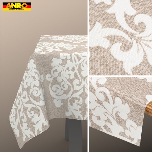 Anro Logo. Tischdecke mit weißem Damastmuster auf braunem strukturiertem Gewebe und Detailansicht der Textur.