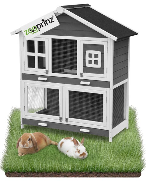 Zooprinz doppelstöckiger Kleintierstall aus Holz mit Metalldraht und Giebeldach auf einer Rasenfläche.