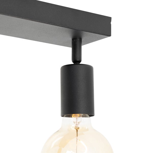 Detailaufnahme einer Deckenleuchte mit Glühbirne.