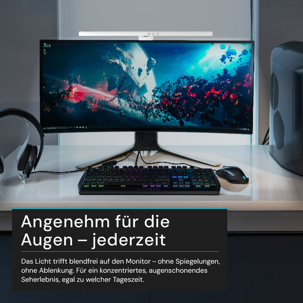 Arbeitsplatz mit Computermonitor, Tastatur und Maus