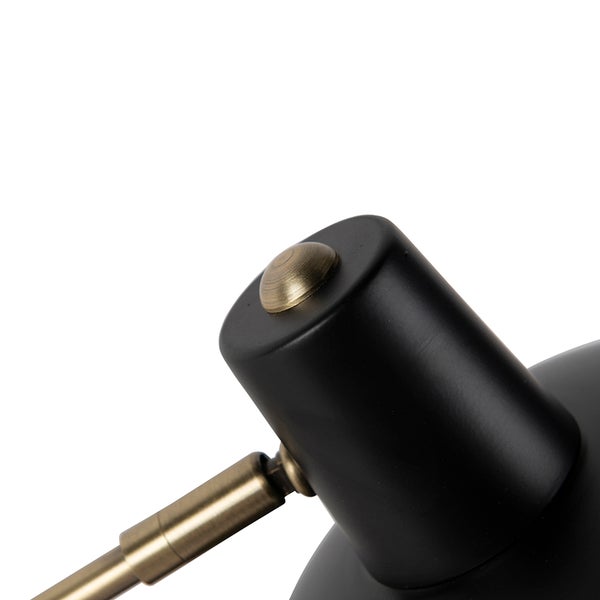 Detail einer Leuchte mit Schwenkarm und Drehknopf