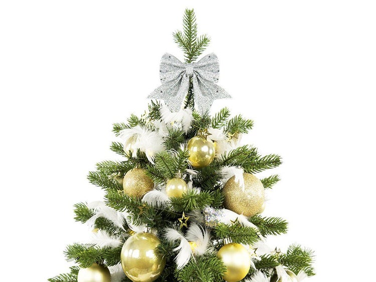 Weihnachtsbaumspitze in Form einer glitzernden Schleife auf einem geschmückten Tannenbaum
