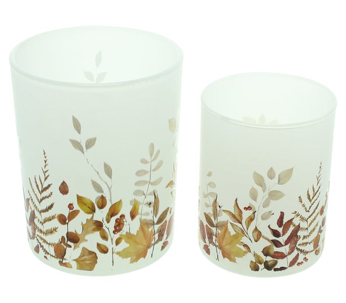 Zwei Windlichter aus Glas mit Herbstlaubmotiven