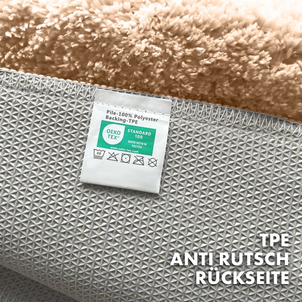 Rückseite eines Teppichs mit Antirutschbeschichtung und Etikett mit Öko-Tex Standard 100 Siegel