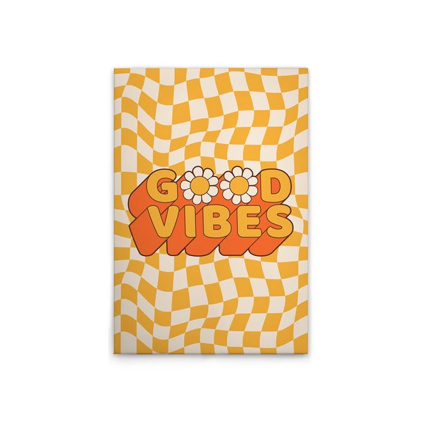 Notizbuch mit Schachbrettmuster und dem Text Gute Stimmung