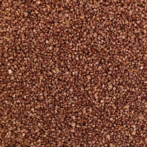 Dekorative Mineralkörnung mit bronze-metallischem Effekt.