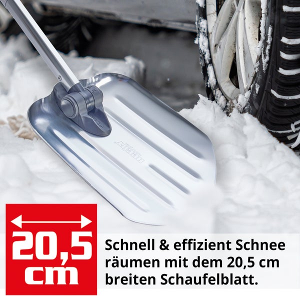 Aluminium Schneeschaufel mit 20,5 Zentimeter breitem Schaufelblatt zum Schneeräumen vor einem Autoreifen