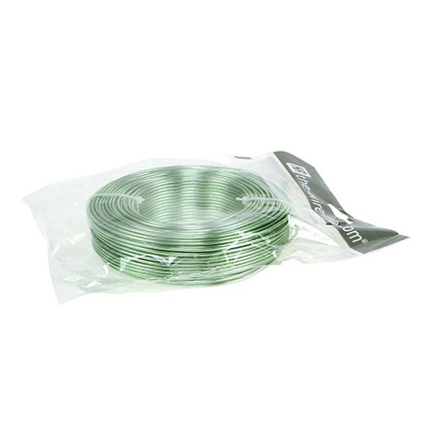 Eine Rolle Metalldraht in einer transparenten Kunststoffverpackung.