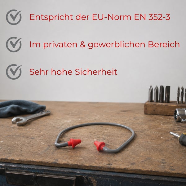 Bügelgehörschutz auf einer Werkbank. Erfüllt EU-Norm EN 352-3, für privaten und gewerblichen Bereich sowie hohe Sicherheit.