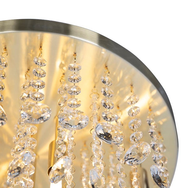 Detailaufnahme einer Deckenleuchte mit Kristallanhängern