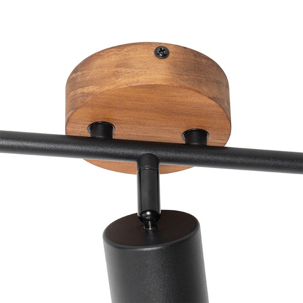 Detailaufnahme einer Deckenleuchte aus Holz und Metall