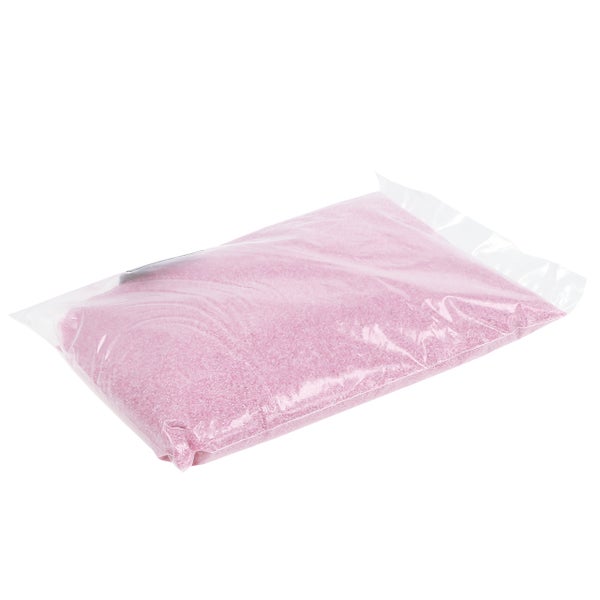 Rosa Dekosand in einem transparenten Kunststoffbeutel.